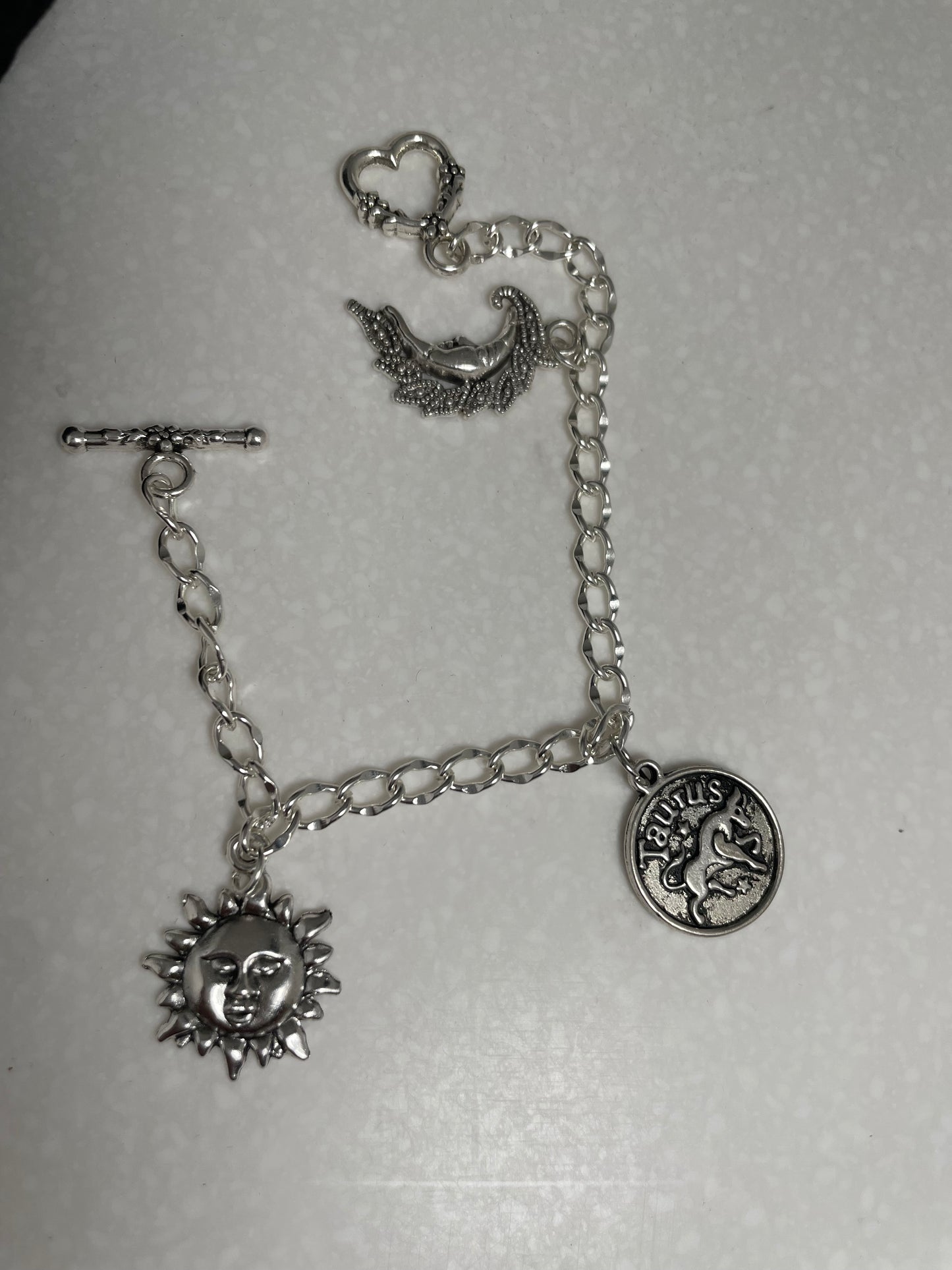 Zodiac-inspired Silver Tone Chain Bracelet with charms - Personalized and Stylish with Toggle Clasp. Great Birthday gift, by Gigi's
