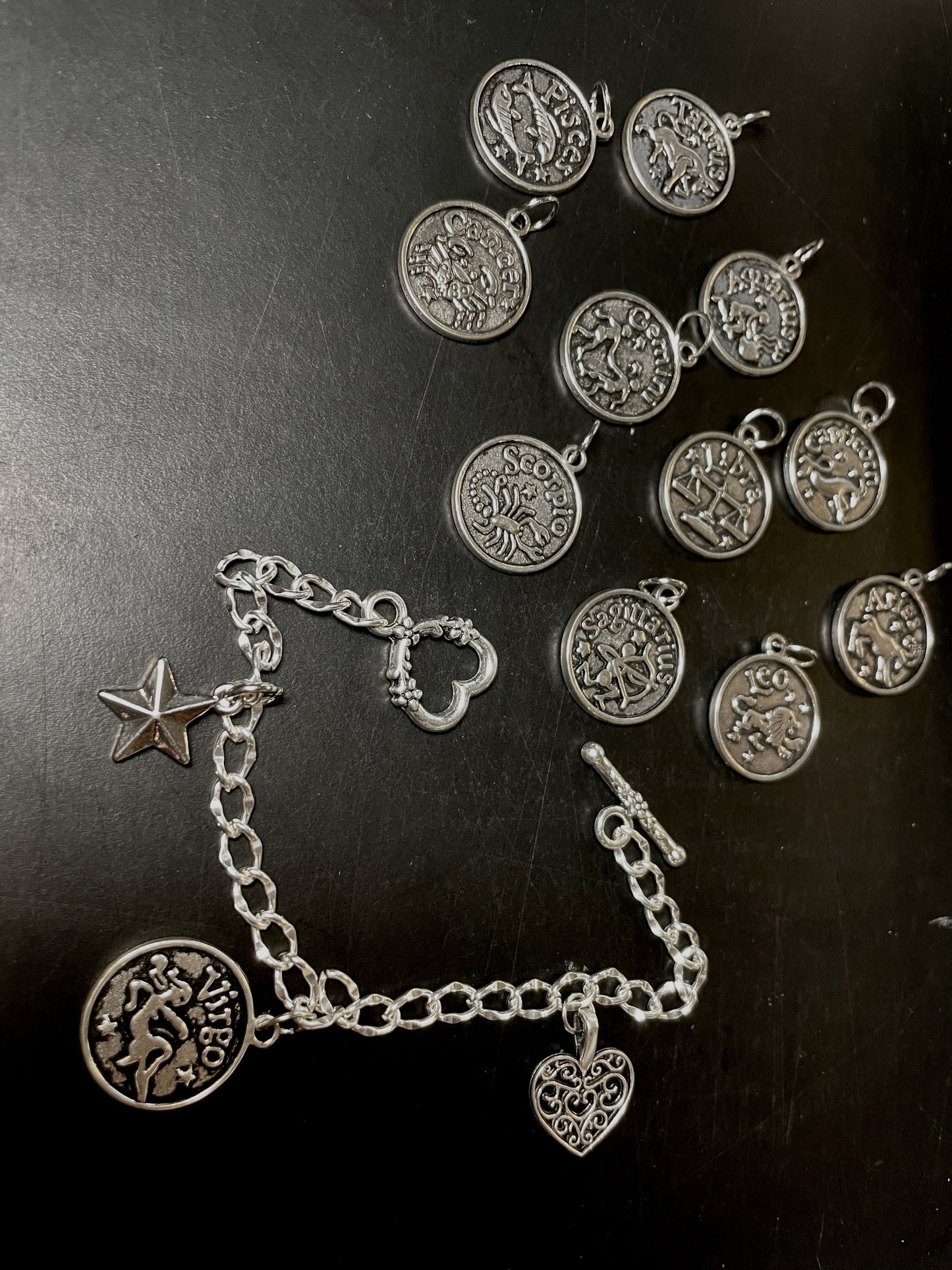 Zodiac-inspired Silver Tone Chain Bracelet with charms - Personalized and Stylish with Toggle Clasp. Great Birthday gift, by Gigi's