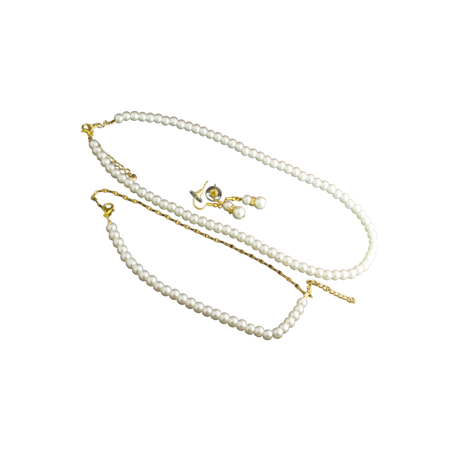 Conjunto de collar, pulsera y pendientes de perlas. Moda elegante y atemporal. El mejor regalo para ella, de Gigi's.